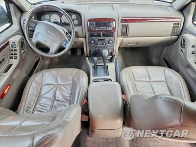 Zdjęcie 8 z 13 samochodu: 2002 JEEP GRAND CHEROKEE LIMITED VIN:1J8GW58N72C129163 - miniatura