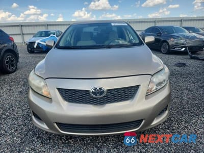 Piąte zdjęcie samochodu w środku: 2009 TOYOTA COROLLA LE VIN:1NXBU40E99Z022189 - miniatura