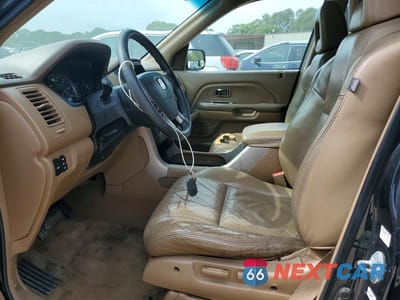 Zdjęcie 7 z 13 samochodu: 2004 HONDA PILOT EXL VIN:2HKYF18534H622088 - miniatura