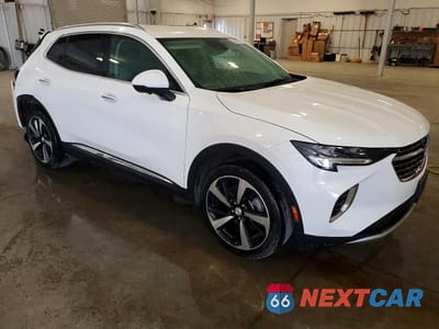 Czwarte zdjęcie samochodu z boku: 2021 BUICK ENVISION ESSENCE VIN:LRBFZPR46MD127735 - miniatura
