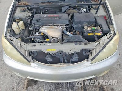 Zdjęcie 11 z 12 samochodu: 2004 TOYOTA CAMRY LE VIN:4T1BE32K64U856570 - miniatura