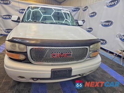 Piąte zdjęcie samochodu w środku: 2006 GMC YUKON DENALI VIN:1GKEK63U86J154741 - miniatura