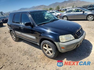 Czwarte zdjęcie samochodu z boku: 1999 HONDA CR-V LX VIN:JHLRD1845XC016425 - miniatura