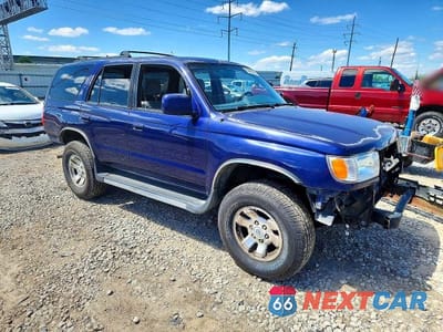 Czwarte zdjęcie samochodu z boku: 1999 TOYOTA 4RUNNER SR5 VIN:JT3HN86R6X0240547 - miniatura