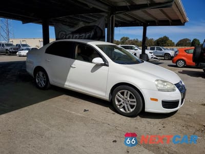 Czwarte zdjęcie samochodu z boku: 2007 VOLKSWAGEN JETTA 2.5 OPTION PACKAGE 1 VIN:3VWRG71K27M089599 - miniatura