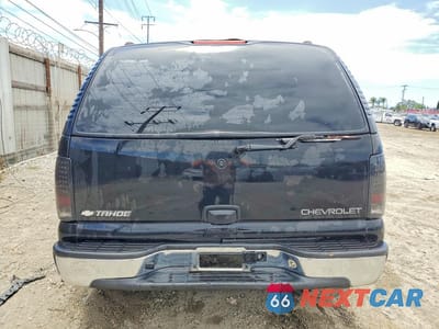 Zdjęcie 6 z 14 samochodu: 2004 CHEVROLET TAHOE C1500 VIN:1GNEC13V04R191860 - miniatura