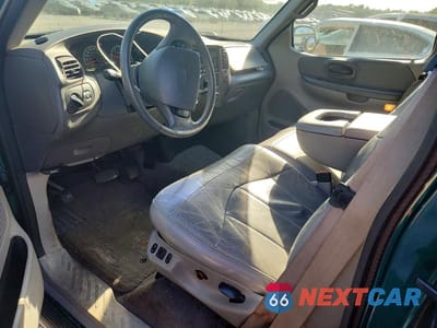 Zdjęcie 8 z 12 samochodu: 2000 FORD F150 VIN:2FTRX07L5YCA56524 - miniatura