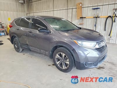Czwarte zdjęcie samochodu z boku: 2018 HONDA CR-V LX VIN:2HKRW5H39JH400984 - miniatura