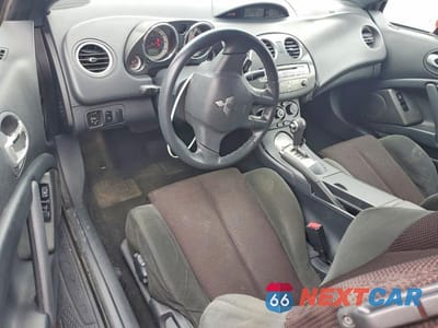 Zdjęcie 8 z 12 samochodu: 2009 MITSUBISHI ECLIPSE SPYDER GS VIN:4A3AL25F19E040086 - miniatura