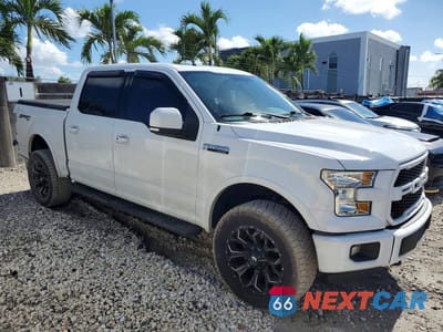 Czwarte zdjęcie samochodu z boku: 2015 FORD F150 SUPERCREW VIN:1FTEW1EF8FFC89416 - miniatura