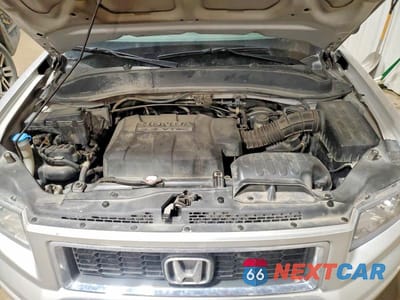 Zdjęcie 11 z 12 samochodu: 2008 HONDA RIDGELINE RTX VIN:2HJYK16338H527019 - miniatura