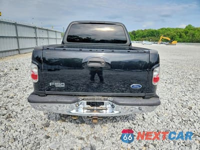 Zdjęcie 6 z 12 samochodu: 2002 FORD F150 SUPERCREW VIN:1FTRW07L42KA48663 - miniatura