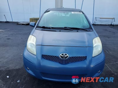 Piąte zdjęcie samochodu w środku: 2011 TOYOTA YARIS BASE VIN:JTDKT4K35B5329958 - miniatura