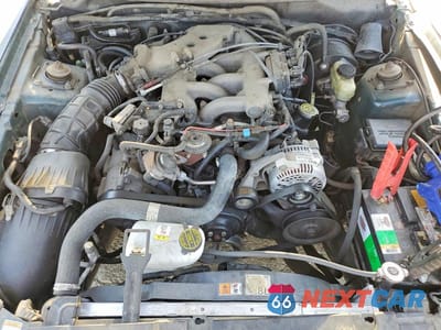 Zdjęcie 11 z 12 samochodu: 1999 FORD MUSTANG VIN:1FAFP4043XF193810 - miniatura