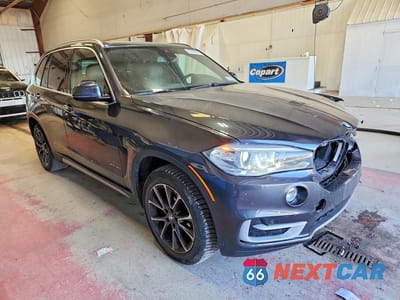 Czwarte zdjęcie samochodu z boku: 2018 BMW X5 XDRIVE35I VIN:5UXKR0C50J0X86632 - miniatura