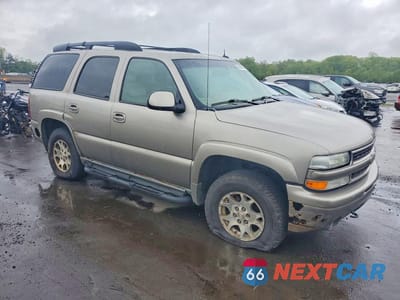 Czwarte zdjęcie samochodu z boku: 2002 CHEVROLET TAHOE K1500 VIN:1GNEK13Z42R324154 - miniatura