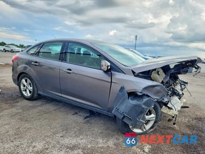 Czwarte zdjęcie samochodu z boku: 2013 FORD FOCUS SE VIN:1FADP3F21DL305704 - miniatura