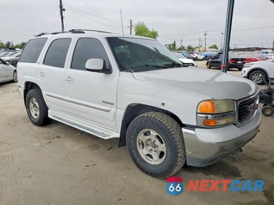 Czwarte zdjęcie samochodu z boku: 2000 GMC YUKON VIN:1GKEK13T0YJ211639 - miniatura