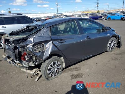 Trzecie zdjęcie samochodu z tyłu: 2022 TOYOTA PRIUS PRIME XLE VIN:JTDKAMFP8N3215794 - miniatura
