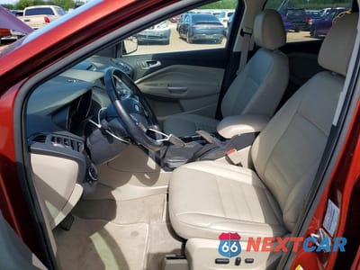 Zdjęcie 7 z 13 samochodu: 2016 FORD ESCAPE TITANIUM VIN:1FMCU0JX3GUB97435 - miniatura
