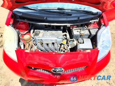 Zdjęcie 12 z 13 samochodu: 2009 TOYOTA YARIS BASE VIN:JTDJT903X95237279 - miniatura