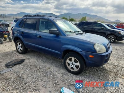 Czwarte zdjęcie samochodu z boku: 2006 HYUNDAI TUCSON GL VIN:KM8JM12B76U338604 - miniatura