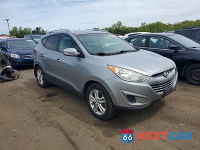 Czwarte zdjęcie samochodu z boku: 2012 HYUNDAI TUCSON GLS VIN:KM8JUCAC5CU541878 - miniatura