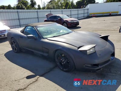 Czwarte zdjęcie samochodu z boku: 2002 CHEVROLET CORVETTE VIN:1G1YY32G825115600 - miniatura