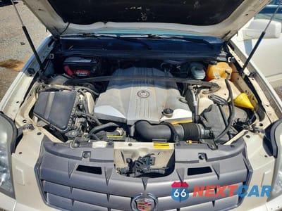 Zdjęcie 11 z 12 samochodu: 2004 CADILLAC SRX VIN:1GYDE63A940126786 - miniatura