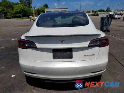Zdjęcie 6 z 12 samochodu: 2021 TESLA MODEL 3 VIN:5YJ3E1EC2MF026565 - miniatura