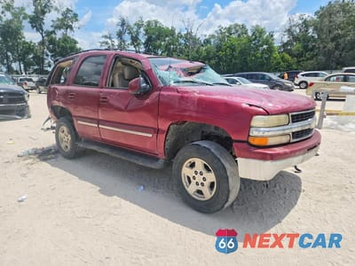 Czwarte zdjęcie samochodu z boku: 2004 CHEVROLET TAHOE K1500 VIN:1GNEK13Z44R260278 - miniatura