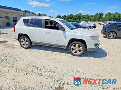 Czwarte zdjęcie samochodu z boku: 2011 JEEP COMPASS SPORT VIN:1J4NT1FB1BD260778 - miniatura