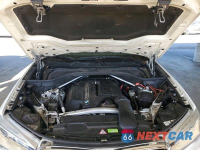 Zdjęcie 11 z 12 samochodu: 2014 BMW X5 SDRIVE35I VIN:5UXKR2C55E0C00883 - miniatura