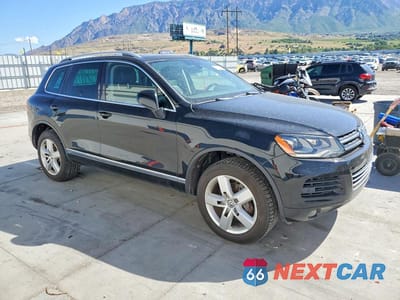 Czwarte zdjęcie samochodu z boku: 2011 VOLKSWAGEN TOUAREG V6 VIN:WVGFF9BP9BD006779 - miniatura