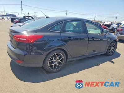 Trzecie zdjęcie samochodu z tyłu: 2018 FORD FOCUS SEL VIN:1FADP3H24JL221370 - miniatura