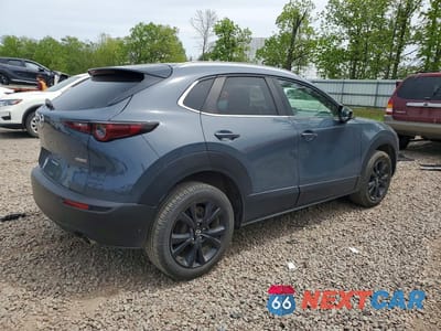 Trzecie zdjęcie samochodu z tyłu: 2022 MAZDA CX-30 VIN:3MVDMBCL5NM453329 - miniatura