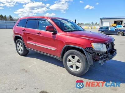 Czwarte zdjęcie samochodu z boku: 2012 JEEP GRAND CHEROKEE LAREDO VIN:1C4RJFAG0CC269184 - miniatura