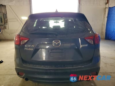 Zdjęcie 6 z 13 samochodu: 2014 MAZDA CX-5 TOURING VIN:JM3KE2CY4E0422195 - miniatura
