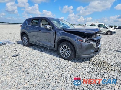 Czwarte zdjęcie samochodu z boku: 2023 MAZDA CX-5 PREFERRED VIN:JM3KFBCM2P0231940 - miniatura