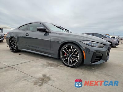 Czwarte zdjęcie samochodu z boku: 2021 BMW M440XI VIN:WBA13AR05MCF44163 - miniatura