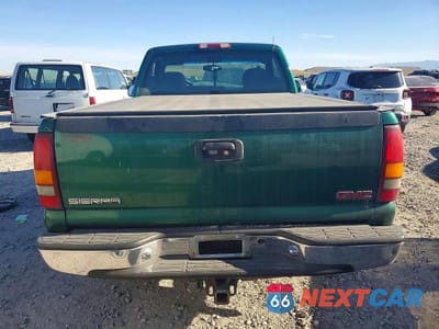 Zdjęcie 6 z 12 samochodu: 1999 GMC NEW SIERRA K1500 VIN:1GTEK14T4XZ517799 - miniatura