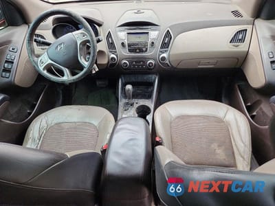 Zdjęcie 8 z 14 samochodu: 2011 HYUNDAI TUCSON GLS VIN:KM8JU3ACXBU120561 - miniatura