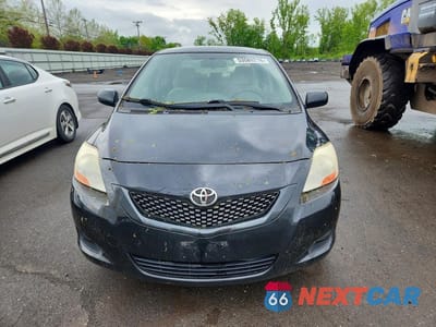 Piąte zdjęcie samochodu w środku: 2010 TOYOTA YARIS BASE VIN:JTDBT4K36A4076427 - miniatura