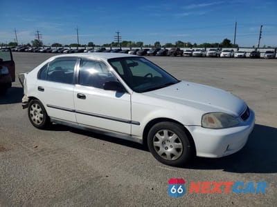 Czwarte zdjęcie samochodu z boku: 1999 HONDA CIVIC LX VIN:2HGEJ6670XH592467 - miniatura