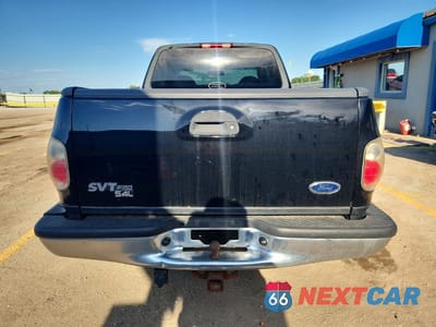 Zdjęcie 6 z 12 samochodu: 2000 FORD F150 VIN:1FTRX08L6YKB35548 - miniatura