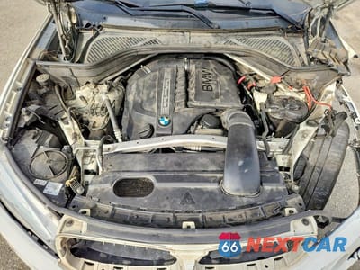 Zdjęcie 12 z 14 samochodu: 2014 BMW X5 SDRIVE35I VIN:5UXKR2C57E0H32250 - miniatura