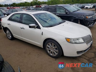 Czwarte zdjęcie samochodu z boku: 2010 LINCOLN MKZ VIN:3LNHL2GCXAR642907 - miniatura
