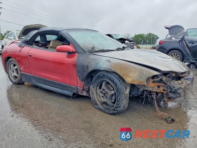 Czwarte zdjęcie samochodu z boku: 1999 MITSUBISHI ECLIPSE SPYDER GST VIN:4A3AX55F7XE063794 - miniatura