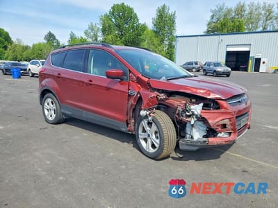 Czwarte zdjęcie samochodu z boku: 2016 FORD ESCAPE SE VIN:1FMCU9G99GUC00447 - miniatura