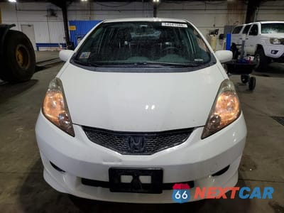 Piąte zdjęcie samochodu w środku: 2009 HONDA FIT SPORT VIN:JHMGE88679S051776 - miniatura
